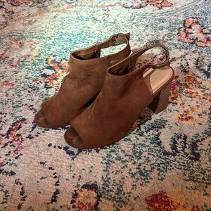 Sling back wedge sandals.